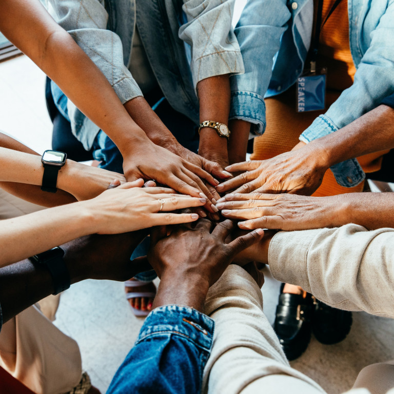 hands of people working together